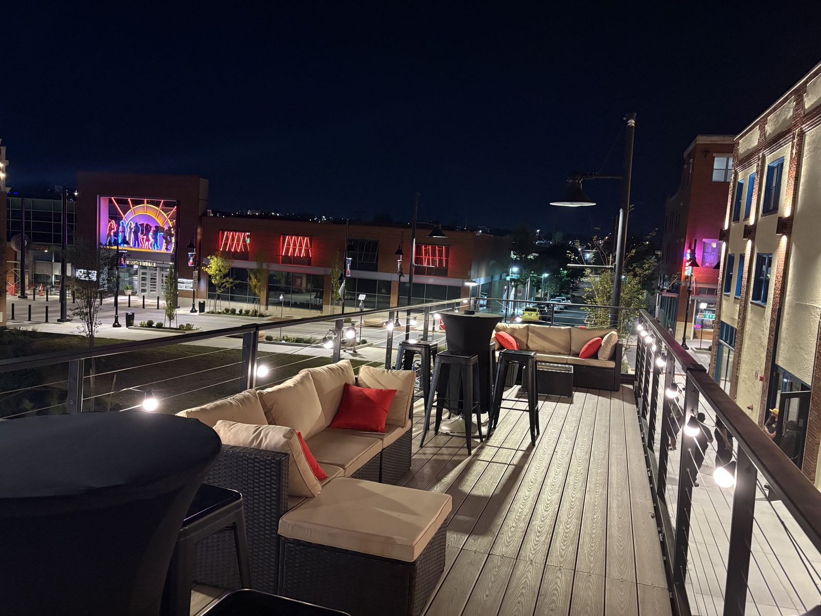 Rooftop lounge seating at night during the Wu-Tang event