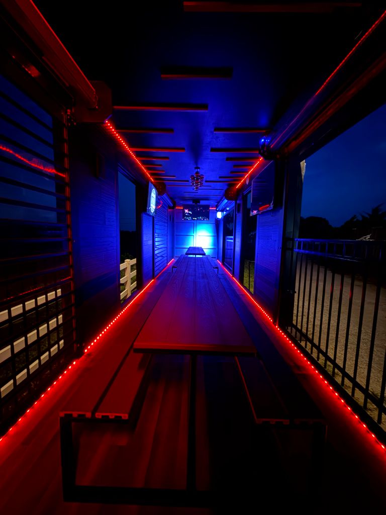 Symmetrical interior with red and blue lighting